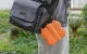 Sunnylife pārnēsāšanas futrālis ar karabīni DJI Neo 2 dronam, oranžs