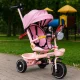 ECOTOYS bērnu trīsritenis ar rotējošu sēdekli un stumšanas rokturi, rozā