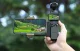 Sunnylife OP3-AD744 tālruņa turētājs ar piederumu maciņu DJI Osmo Pocket 3