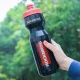 Rockbros velosipēda pudele 750 ml, caurspīdīgi melna ar sarkanu iemuti