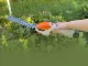 Akumulatora zāles un krūmu šķēres 2-in-1, balts/oranžs